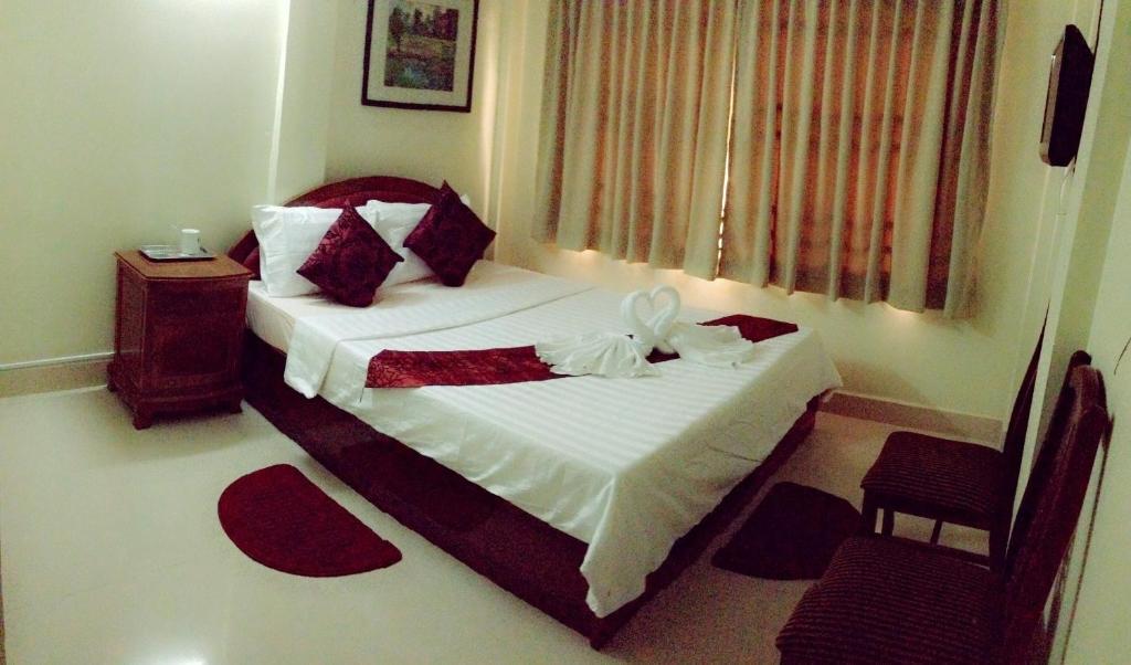 Homeland Guesthouse พนมเปญ ห้อง รูปภาพ