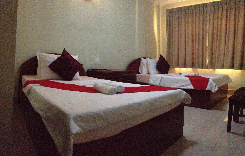 Homeland Guesthouse พนมเปญ ห้อง รูปภาพ