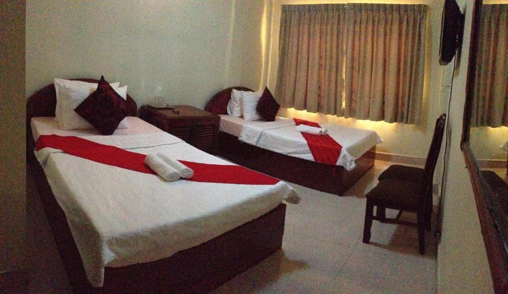 Homeland Guesthouse พนมเปญ ห้อง รูปภาพ